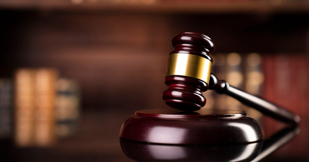 Close-up view of a wooden gavel representing justice and tenant law