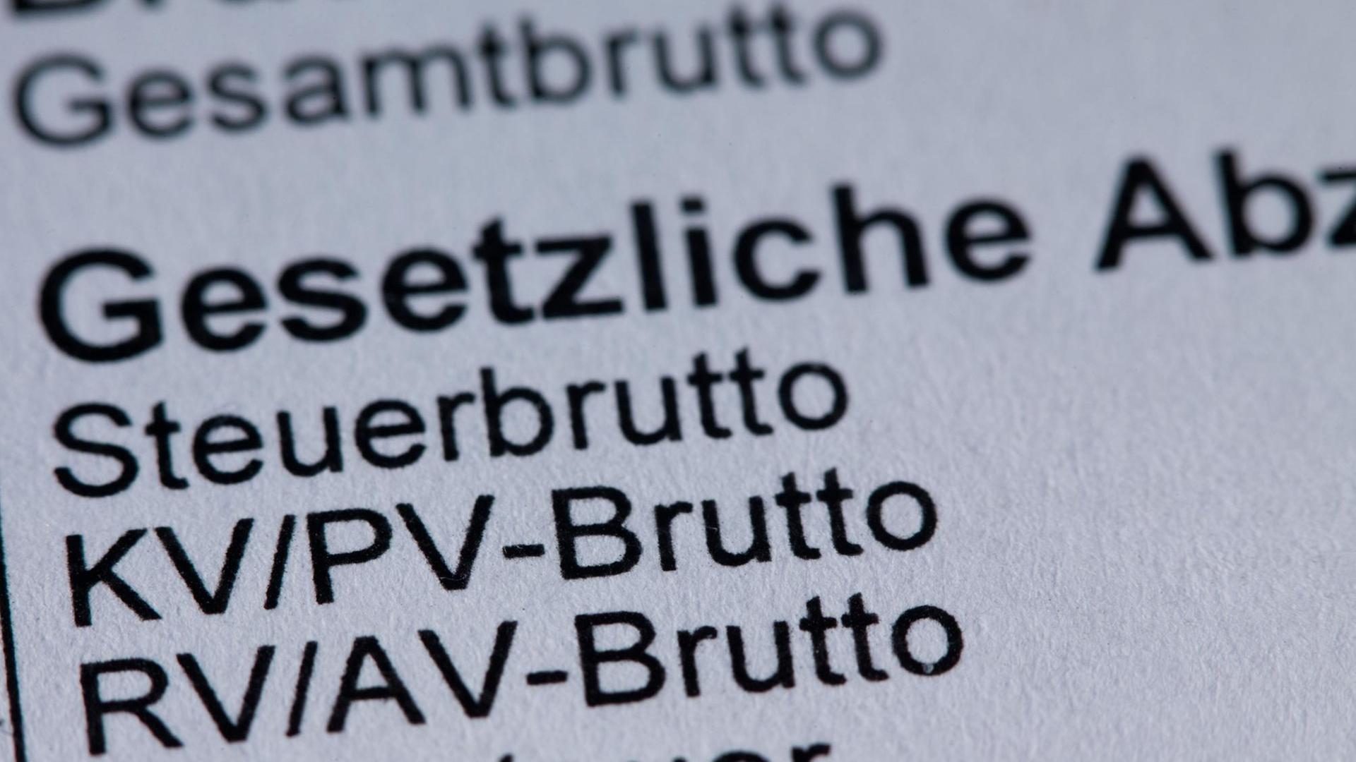 Close-up of a German payslip showing social security deductions, highlighting the impact on net income